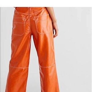 Free People We The Free The It Factor vegan patent leather orange pants